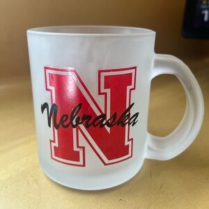Nebraska Cornhuskers frosted glass coffee mug.